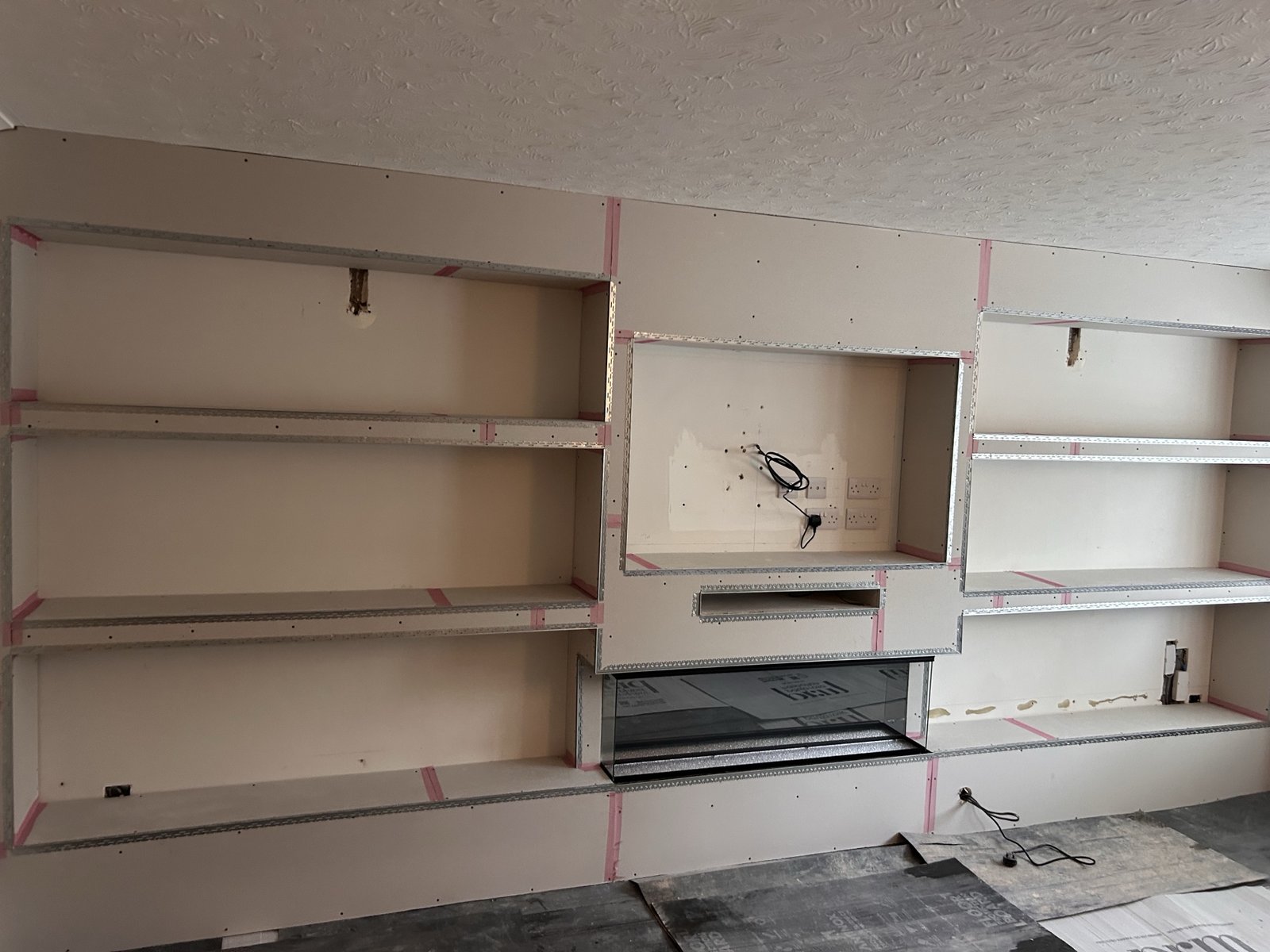 Media wall full shelving layout